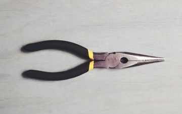 Parallel action pliers used for engine bay wiring connectors