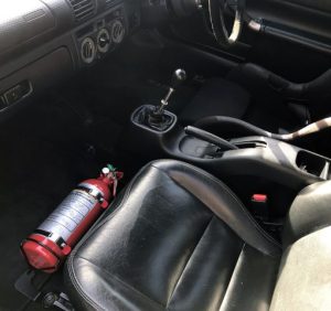 vehicle fire extinguisher mounting safety inside a car