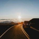 Travelers enjoying music and entertainment during a weekend road trip