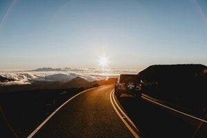Travelers enjoying music and entertainment during a weekend road trip