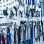 Organized garage workspace with tools stored within easy reach