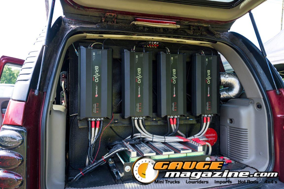 Car audio competitors demonstrate custom sound systems during Slamology 2026 Audio