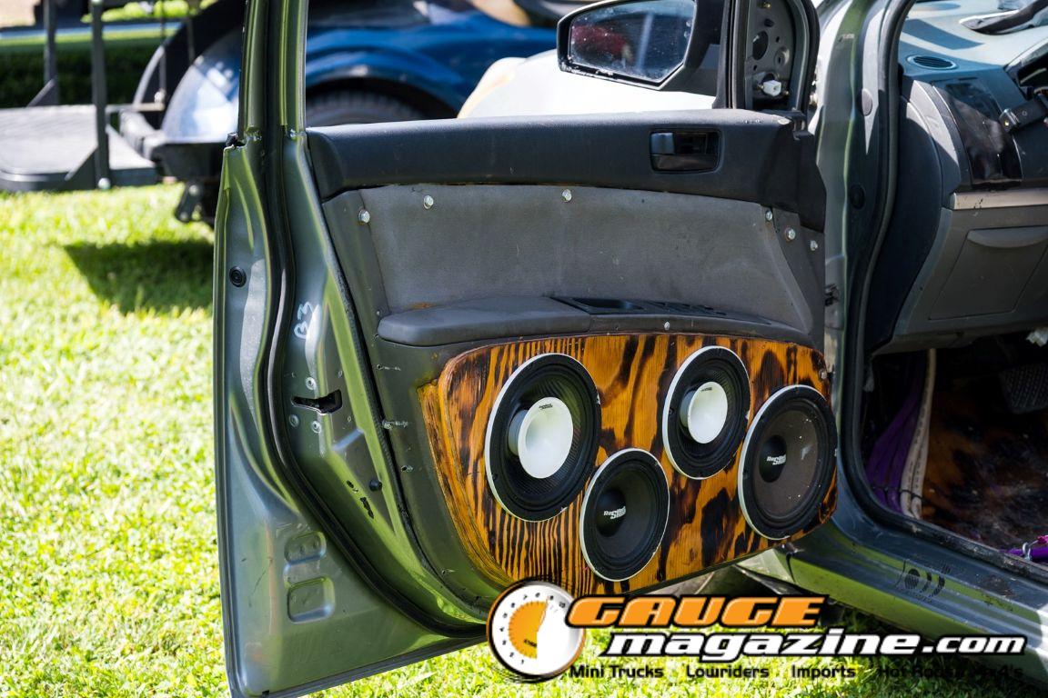 Car audio competitors demonstrate custom sound systems during Slamology 2026 Audio
