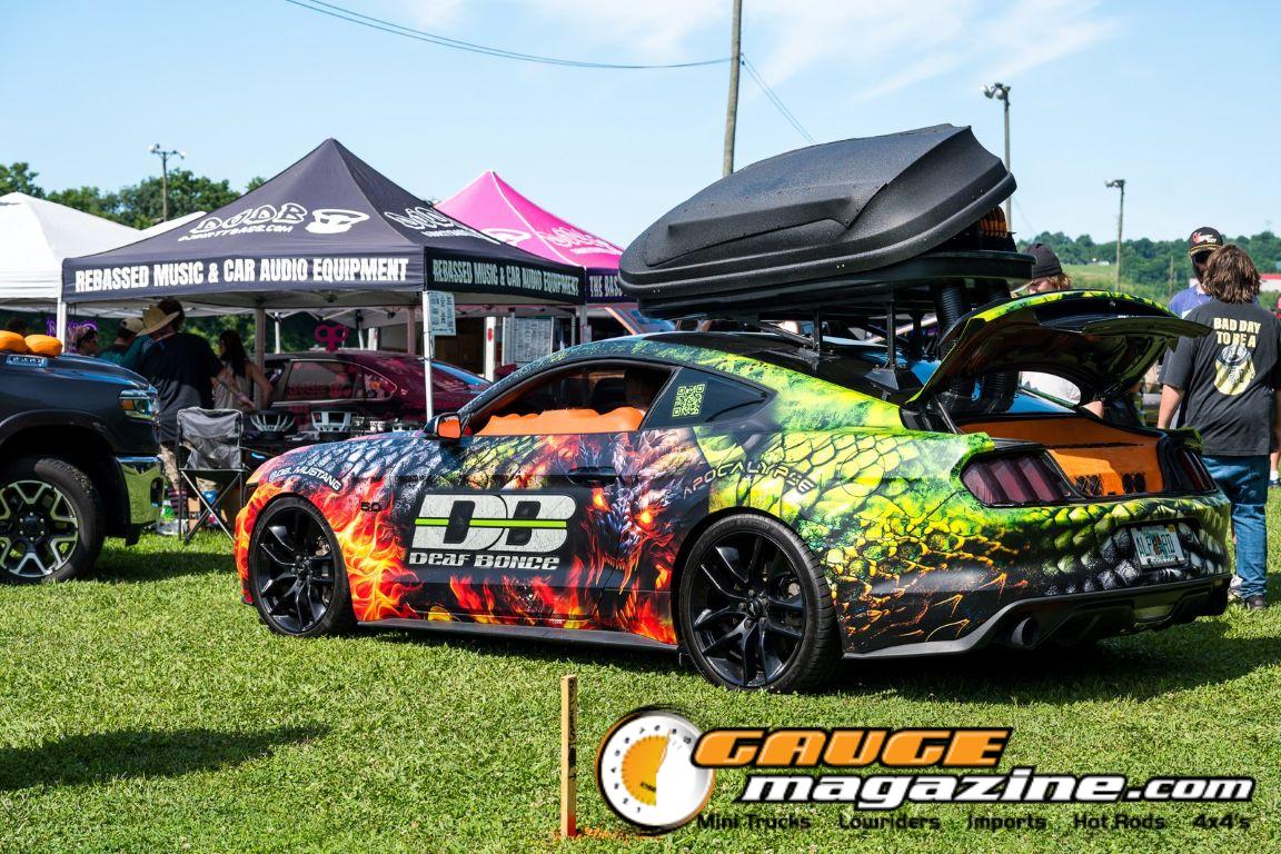 Car audio competitors demonstrate custom sound systems during Slamology 2026 Audio