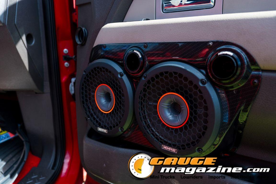 Car audio competitors demonstrate custom sound systems during Slamology 2026 Audio