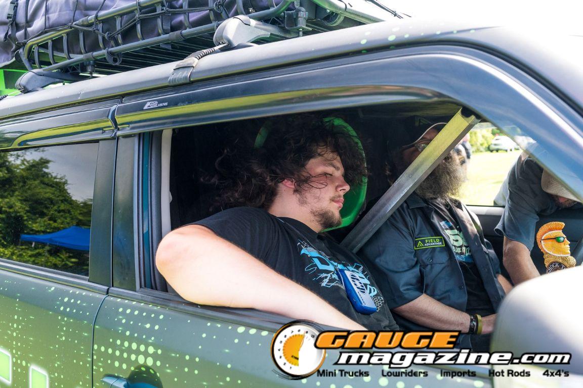 Car audio competitors demonstrate custom sound systems during Slamology 2026 Audio