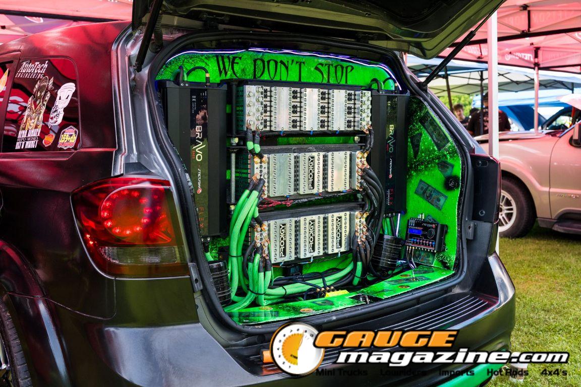 Car audio competitors demonstrate custom sound systems during Slamology 2026 Audio