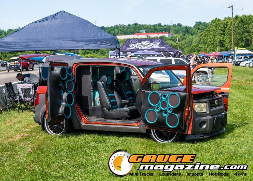 Car audio competitors demonstrate custom sound systems during Slamology 2026 Audio