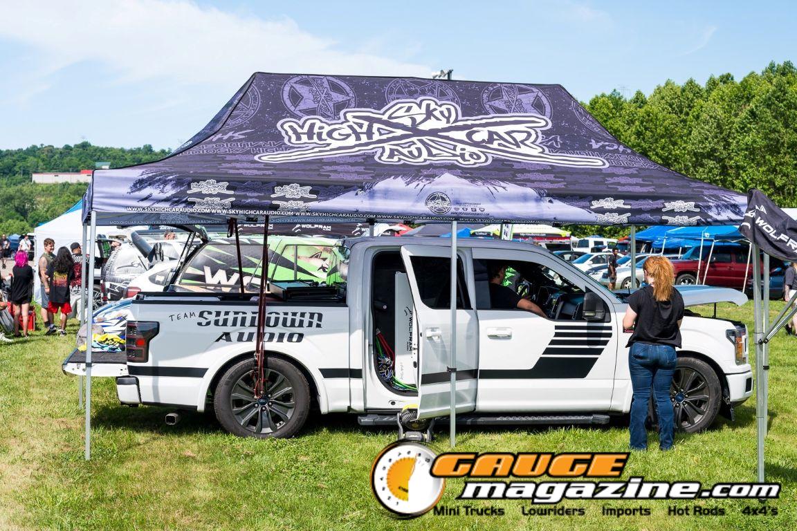 Car audio competitors demonstrate custom sound systems during Slamology 2026 Audio