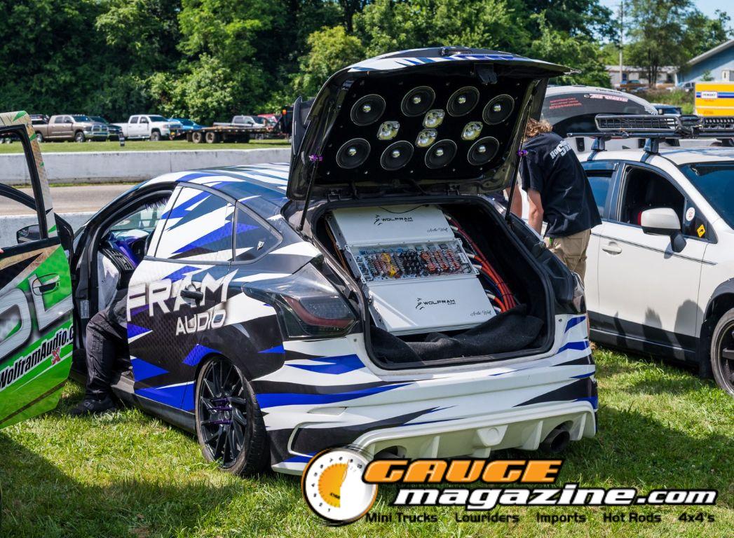 Car audio competitors demonstrate custom sound systems during Slamology 2026 Audio