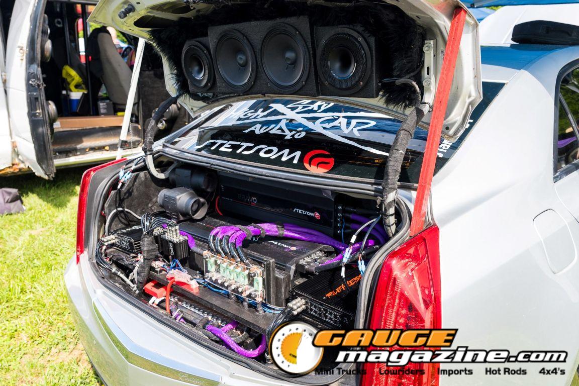 Car audio competitors demonstrate custom sound systems during Slamology 2026 Audio