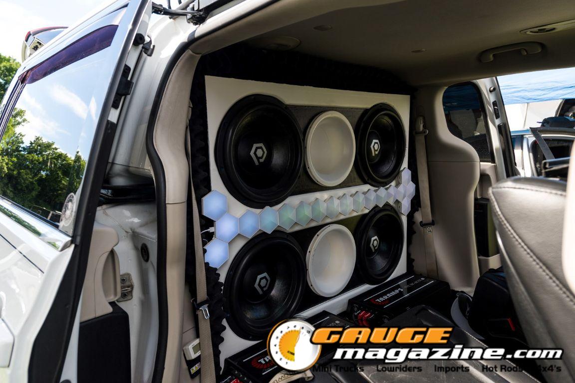 Car audio competitors demonstrate custom sound systems during Slamology 2026 Audio