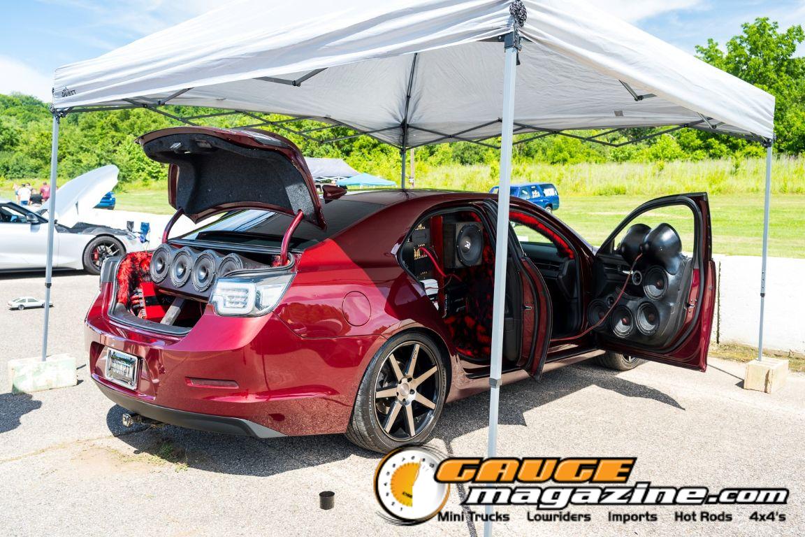 Car audio competitors demonstrate custom sound systems during Slamology 2026 Audio