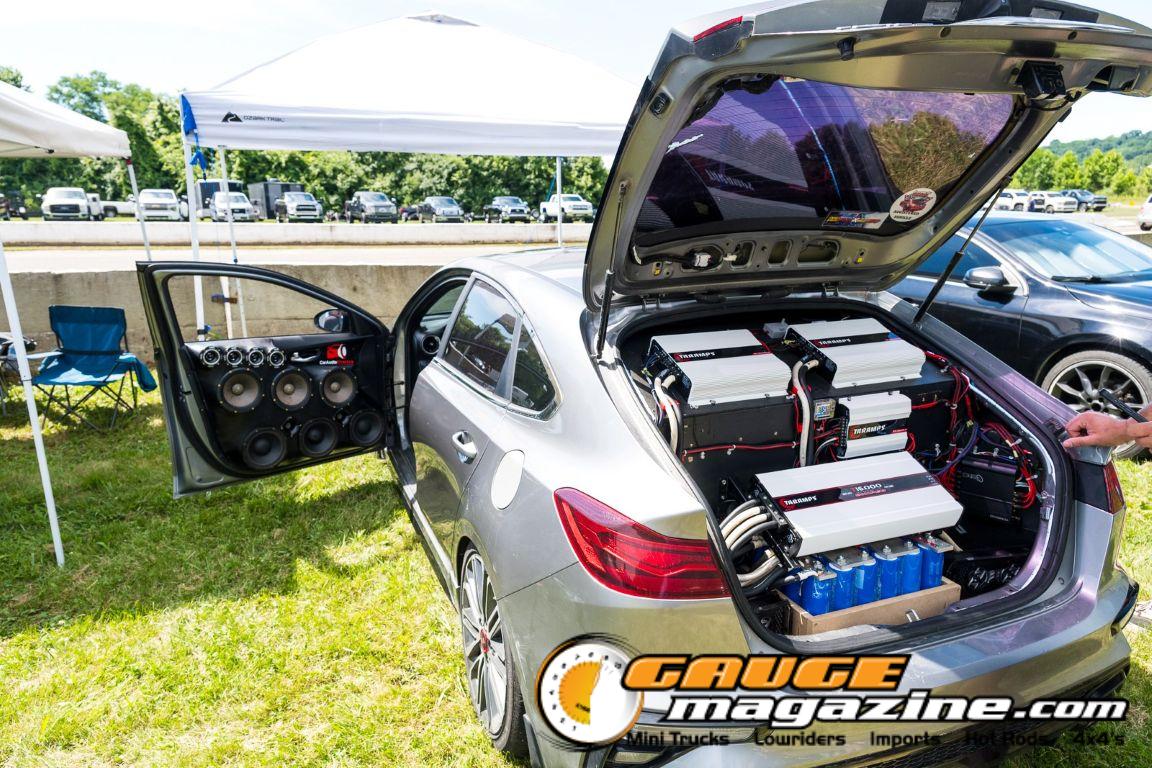 Car audio competitors demonstrate custom sound systems during Slamology 2026 Audio