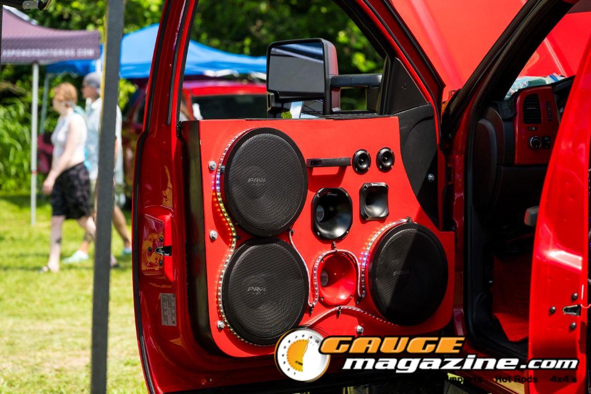 Car audio competitors demonstrate custom sound systems during Slamology 2026 Audio