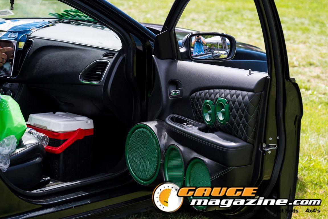 Car audio competitors demonstrate custom sound systems during Slamology 2026 Audio