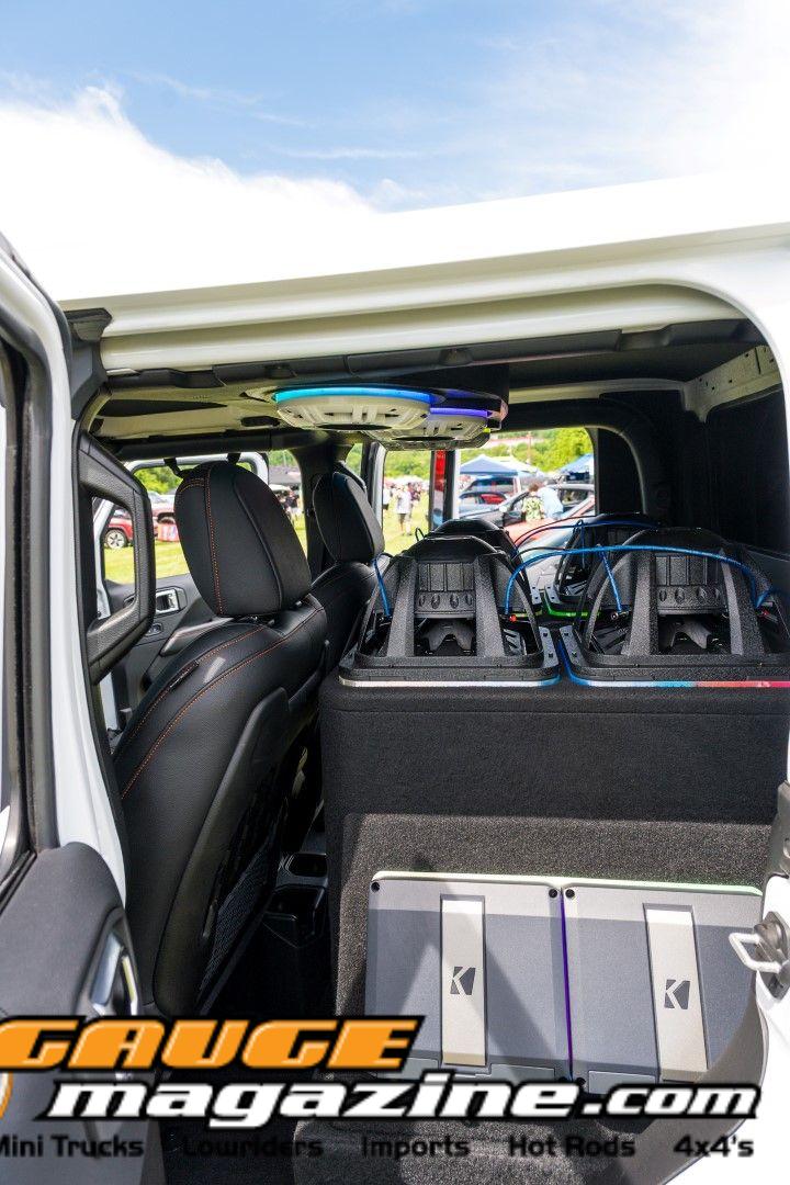 Car audio competitors demonstrate custom sound systems during Slamology 2026 Audio