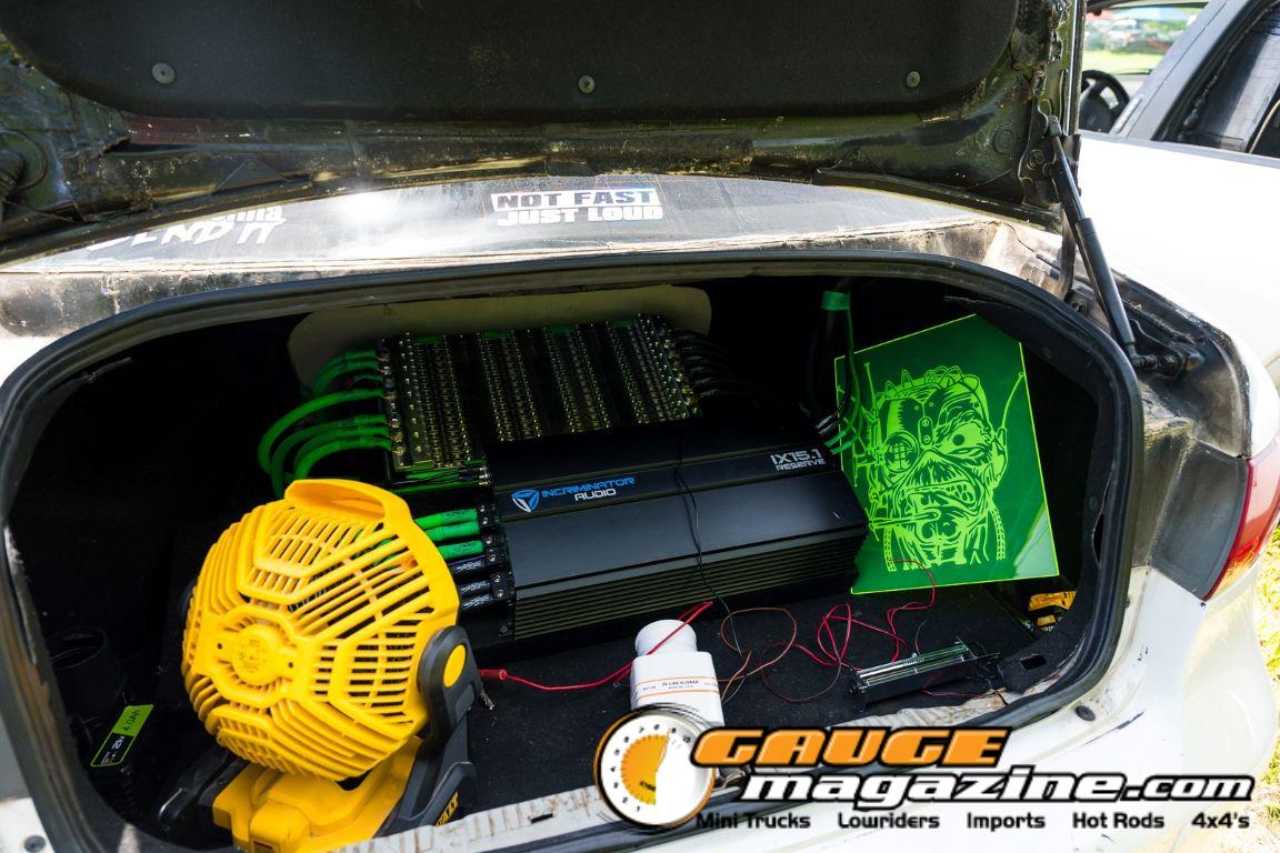Car audio competitors demonstrate custom sound systems during Slamology 2026 Audio