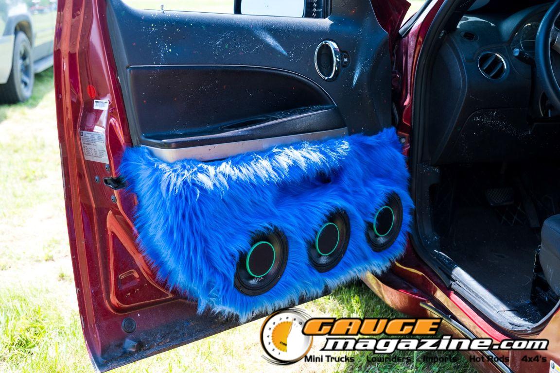 Car audio competitors demonstrate custom sound systems during Slamology 2026 Audio