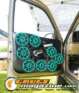 Car audio competitors demonstrate custom sound systems during Slamology 2026 Audio