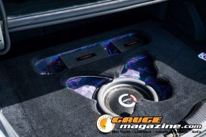 Car audio competitors demonstrate custom sound systems during Slamology 2026 Audio