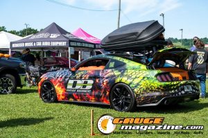 Car audio competitors demonstrate custom sound systems during Slamology 2026 Audio