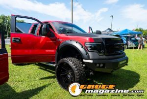 Car audio competitors demonstrate custom sound systems during Slamology 2026 Audio