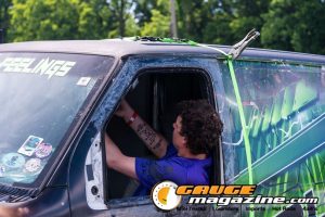 Car audio competitors demonstrate custom sound systems during Slamology 2026 Audio