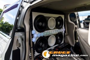 Car audio competitors demonstrate custom sound systems during Slamology 2026 Audio