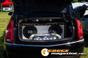 Car audio competitors demonstrate custom sound systems during Slamology 2026 Audio