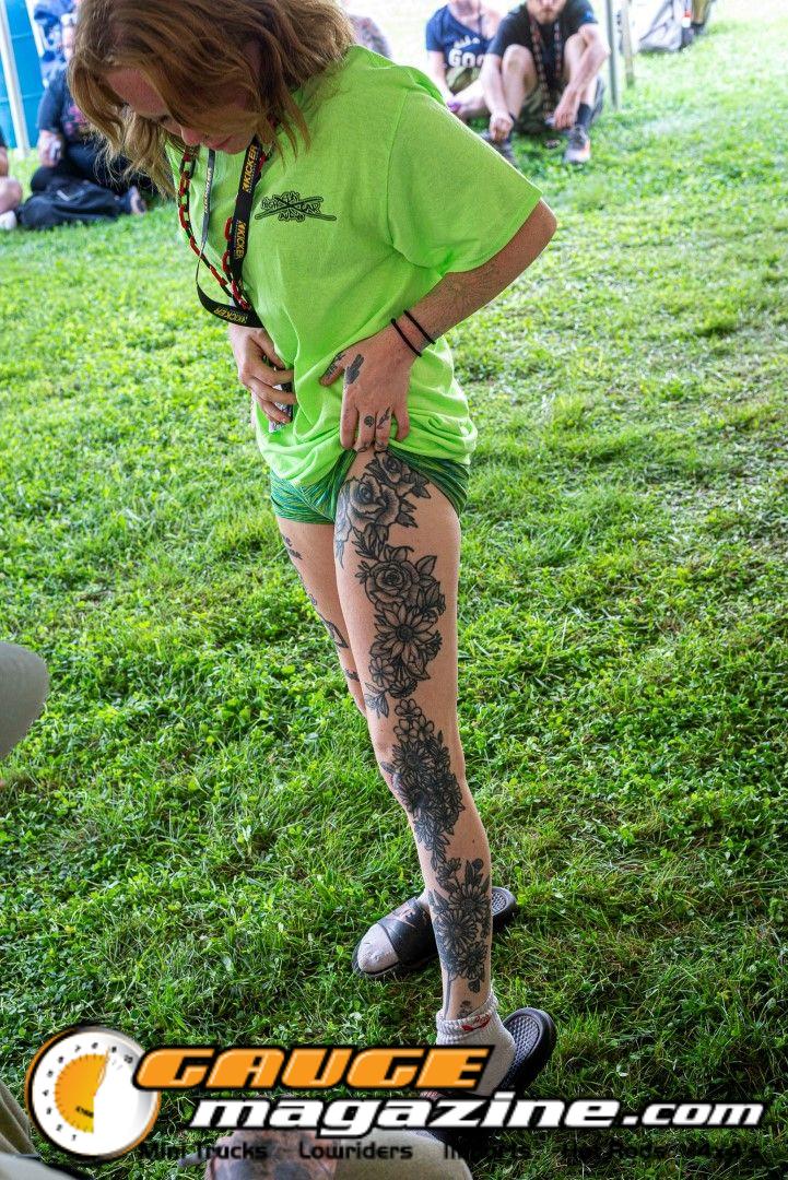 Contestants showing tattoo artwork during the Slamology 2026 Tattoo Contest on the Orion Car Audio Stage