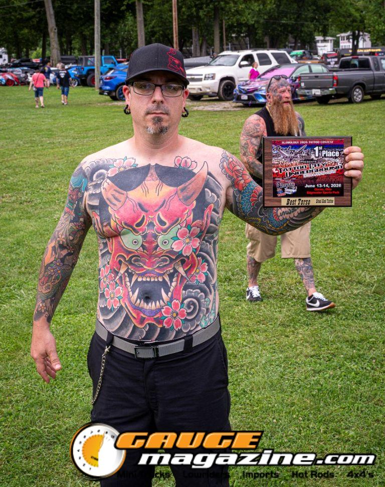 Contestants showing tattoo artwork during the Slamology 2026 Tattoo Contest on the Orion Car Audio Stage