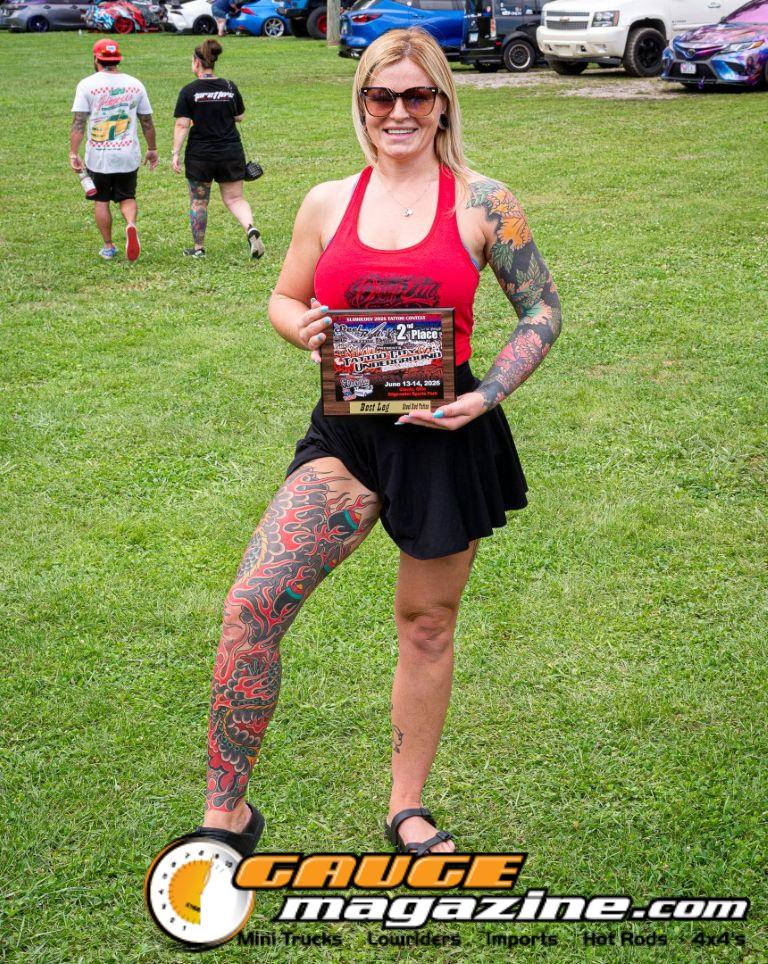 Contestants showing tattoo artwork during the Slamology 2026 Tattoo Contest on the Orion Car Audio Stage