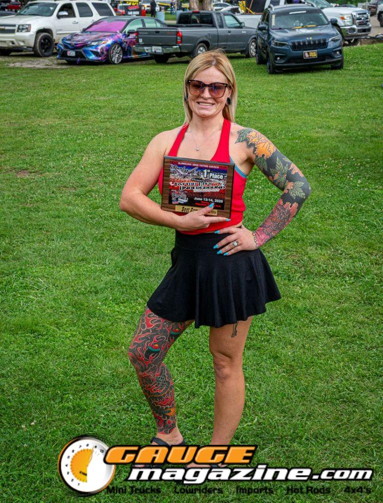 Contestants showing tattoo artwork during the Slamology 2026 Tattoo Contest on the Orion Car Audio Stage