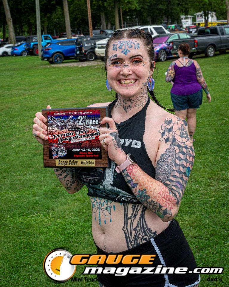 Contestants showing tattoo artwork during the Slamology 2026 Tattoo Contest on the Orion Car Audio Stage
