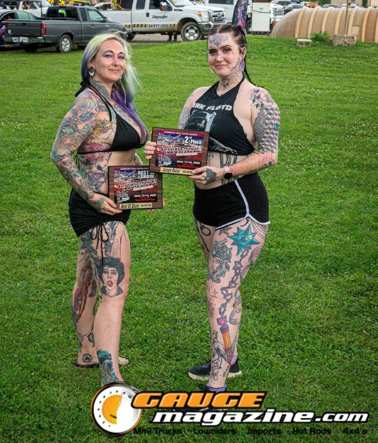 Contestants showing tattoo artwork during the Slamology 2026 Tattoo Contest on the Orion Car Audio Stage