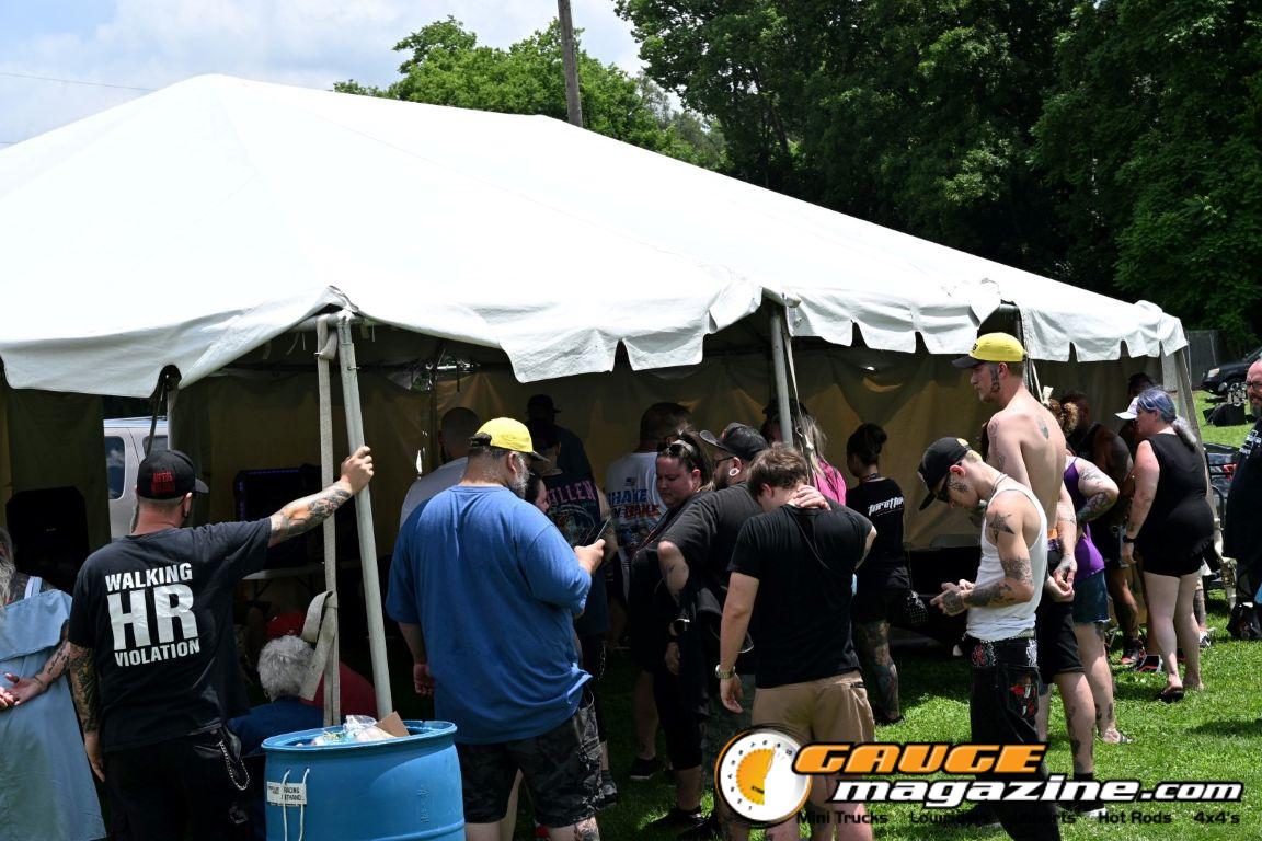 Contestants showing tattoo artwork during the Slamology 2026 Tattoo Contest on the Orion Car Audio Stage