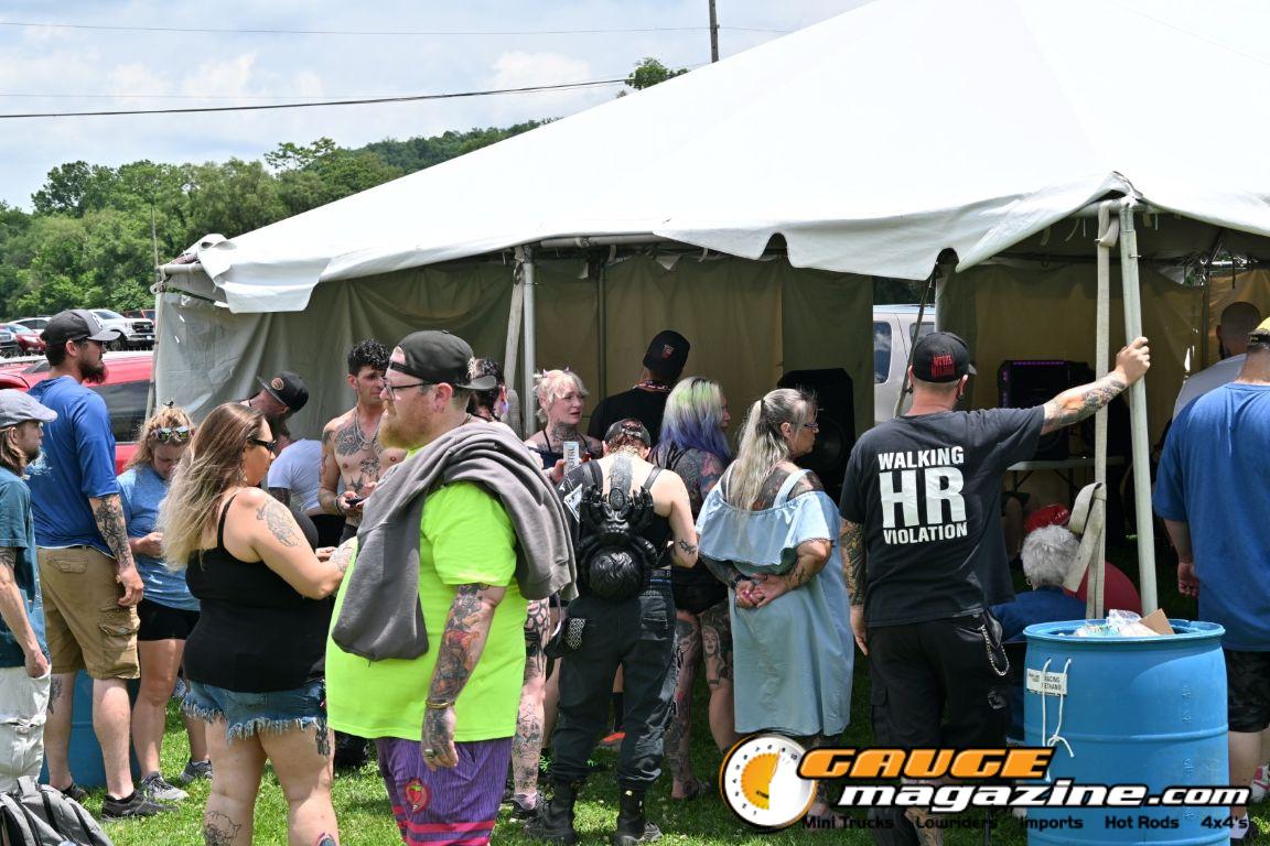 Contestants showing tattoo artwork during the Slamology 2026 Tattoo Contest on the Orion Car Audio Stage