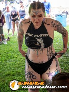 Contestants showing tattoo artwork during the Slamology 2026 Tattoo Contest on the Orion Car Audio Stage