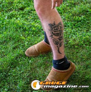 Contestants showing tattoo artwork during the Slamology 2026 Tattoo Contest on the Orion Car Audio Stage