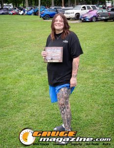 Contestants showing tattoo artwork during the Slamology 2026 Tattoo Contest on the Orion Car Audio Stage