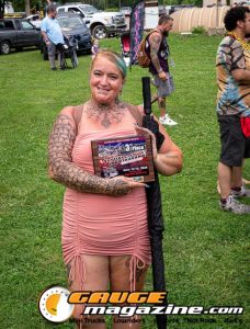 Contestants showing tattoo artwork during the Slamology 2026 Tattoo Contest on the Orion Car Audio Stage