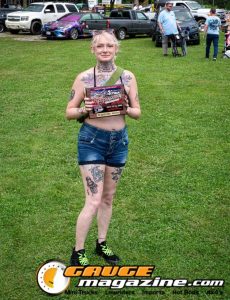 Contestants showing tattoo artwork during the Slamology 2026 Tattoo Contest on the Orion Car Audio Stage