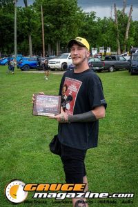 Contestants showing tattoo artwork during the Slamology 2026 Tattoo Contest on the Orion Car Audio Stage