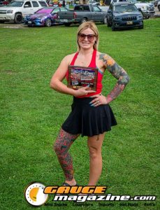 Contestants showing tattoo artwork during the Slamology 2026 Tattoo Contest on the Orion Car Audio Stage