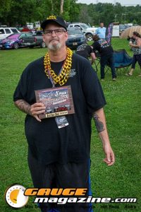 Contestants showing tattoo artwork during the Slamology 2026 Tattoo Contest on the Orion Car Audio Stage