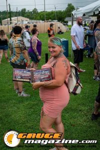 Contestants showing tattoo artwork during the Slamology 2026 Tattoo Contest on the Orion Car Audio Stage
