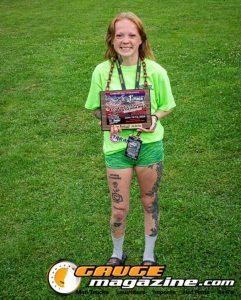 Contestants showing tattoo artwork during the Slamology 2026 Tattoo Contest on the Orion Car Audio Stage