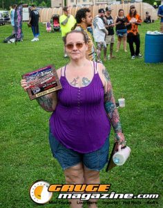 Contestants showing tattoo artwork during the Slamology 2026 Tattoo Contest on the Orion Car Audio Stage