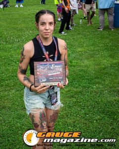 Contestants showing tattoo artwork during the Slamology 2026 Tattoo Contest on the Orion Car Audio Stage